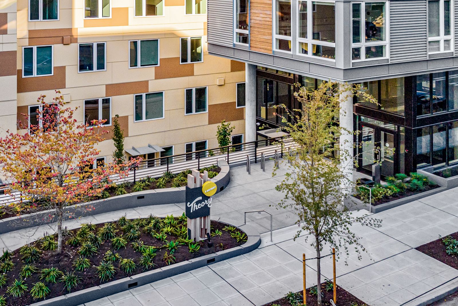 exterior front entrance to building theory apartments seattle