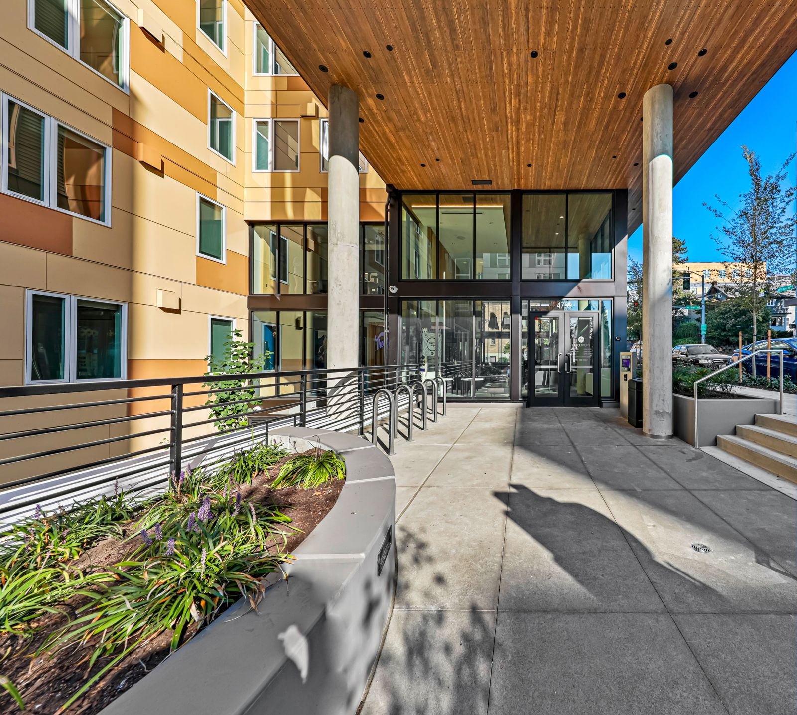 exterior entrance to building theory apartments seattle